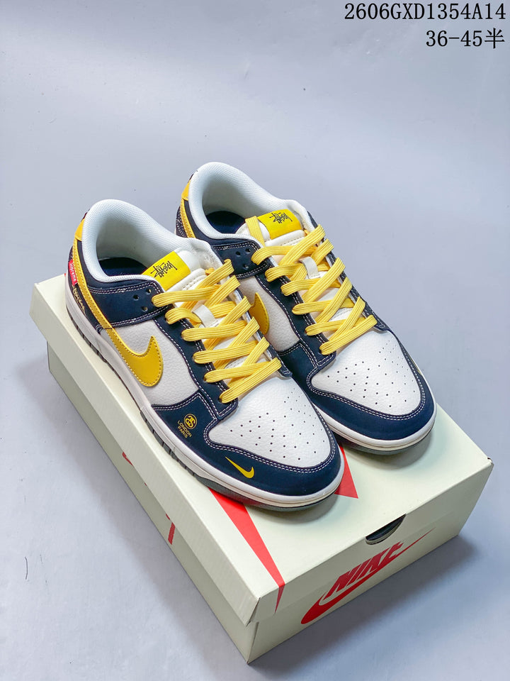 Nike Dunk Low Retro Sneakers in Navy, White and Yellow