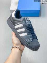 adidas Originals Superstar Low-Top Sneakers in Charcoal and White