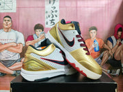 Nike Gold and White Basketball Sneakers