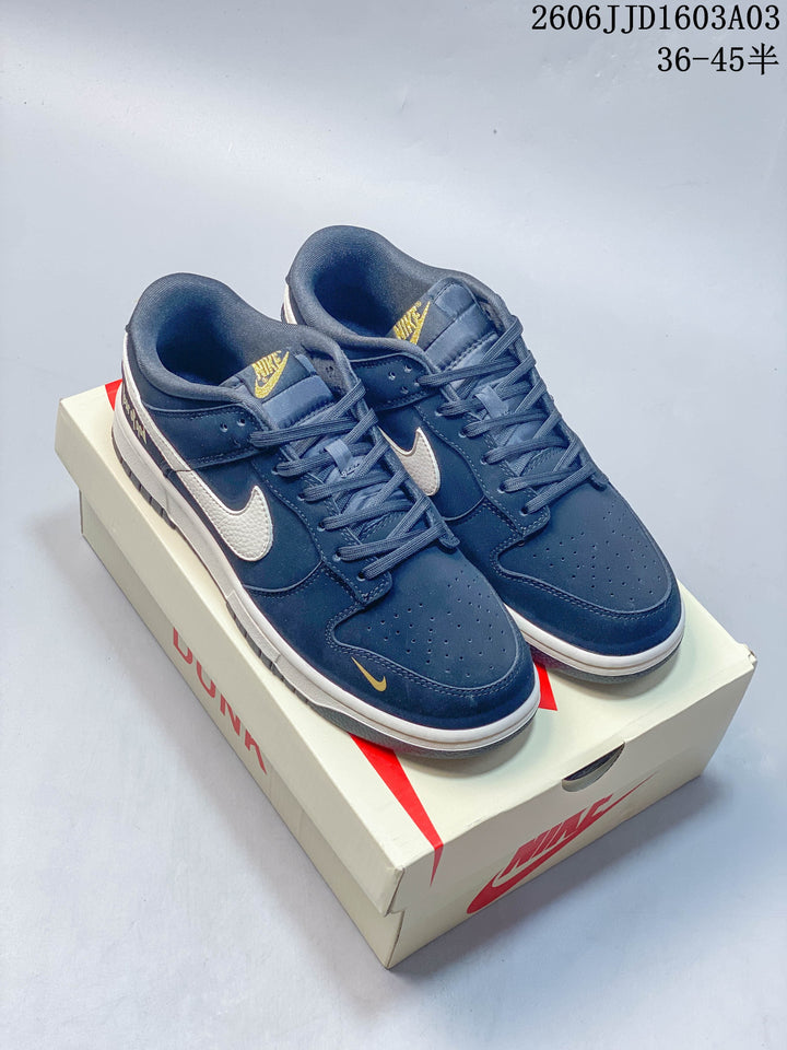 Nike SB Dunk Low Grateful Dead Navy and Cream Sneakers