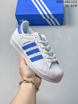 adidas Superstar Shell-Toe Sneakers in White and Color Accents