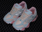 New Balance U9060JG1 Sneakers in Sage and Pink