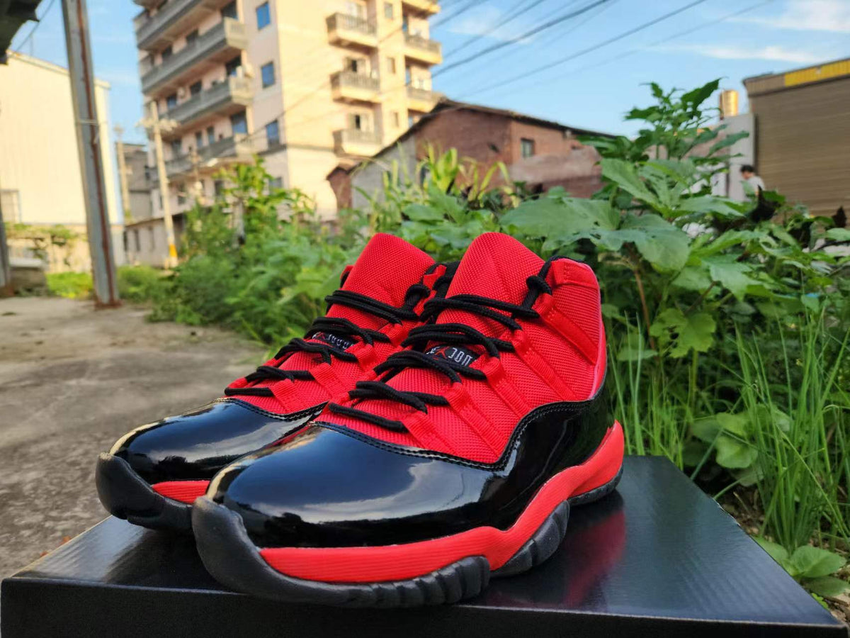 Jordan 11 Red and Black High-Top Sneakers