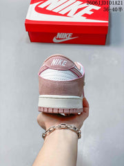 Nike Dunk Low SB Pink and White Low-Top Sneakers