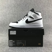 Jordan Air Jordan 1 Mid White Black Metallic Silver Sneakers