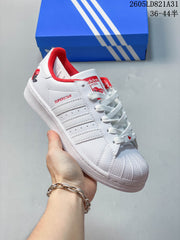 adidas Superstar Shell-Toe Sneakers in White and Color Accents