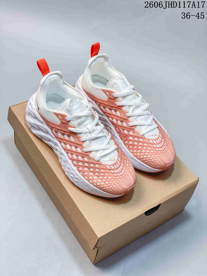Nike Ava Rover Low-Top Sneakers in White and Coral