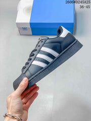 adidas Originals Superstar Low-Top Sneakers in Charcoal and White