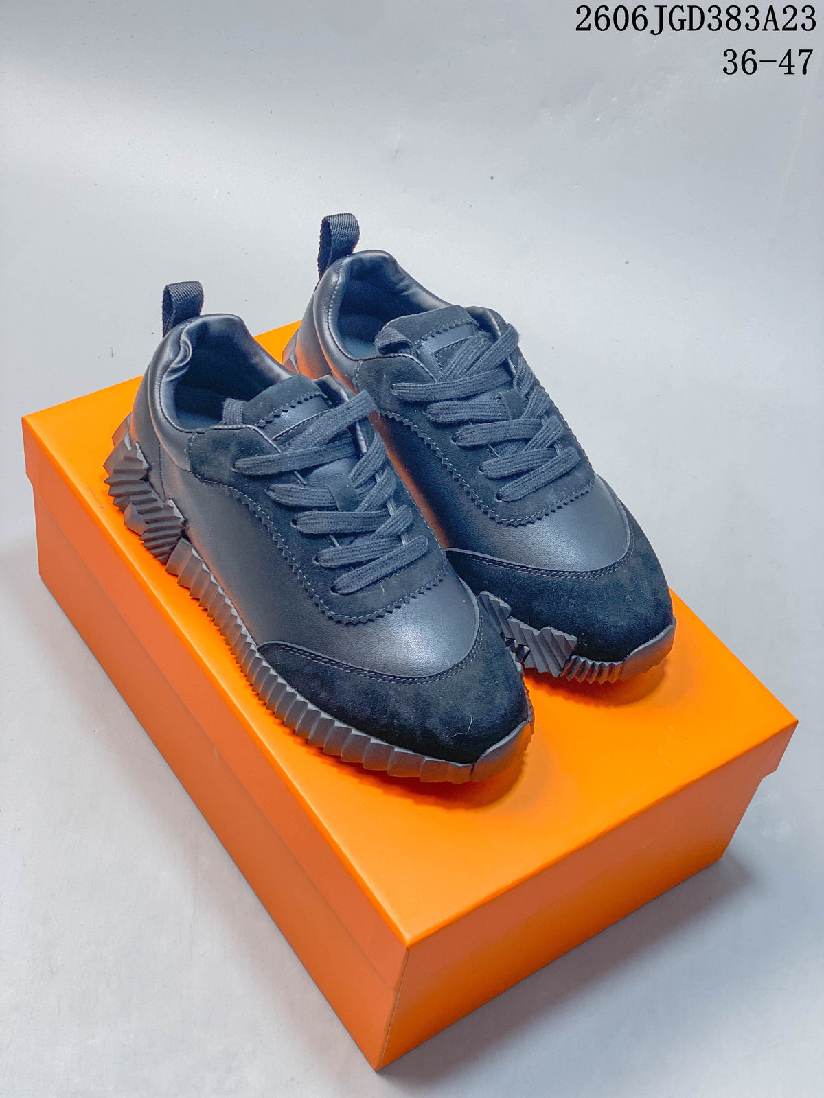 Hermès Low-Top Lace-Up Sneakers in Navy