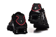Nike Shox TL Black and Orange Sneakers