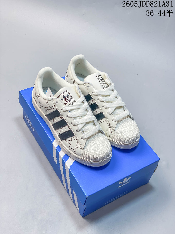 Adidas Superstar White Sneakers with Black Stripes