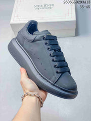 Alexander McQueen Oversized Lace-Up Sneakers in Charcoal