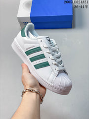 adidas Superstar Shell-Toe Sneakers in White and Color Accents