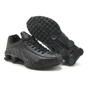 Nike Shox R4 All-Black Embossed Sneakers