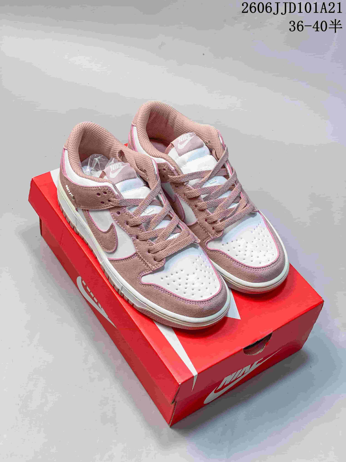 Nike Dunk Low SB Pink and White Low-Top Sneakers
