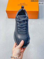 Hermès Low-Top Lace-Up Sneakers in Navy