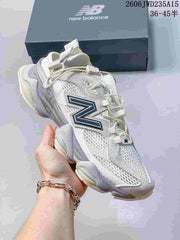New Balance 9060 Sneakers in White and Gray