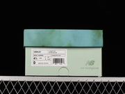 New Balance U9060JG1 Sneakers in Sage and Pink
