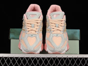 New Balance U9060JG1 Sneakers in Sage and Pink