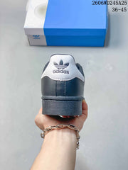 adidas Originals Superstar Low-Top Sneakers in Charcoal and White