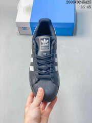 adidas Originals Superstar Low-Top Sneakers in Charcoal and White