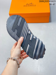 Hermès Low-Top Lace-Up Sneakers in Navy