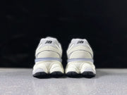 New Balance 9060ZGF Sneakers in White and Grey