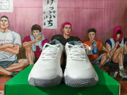 Nike Basketball Sneakers in Gray and White with Orange Swoosh