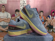 Nike Blue Basketball Sneakers with Yellow and Pink Accents
