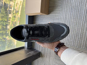 Le Coq Sportif AN-12 Sneakers in Dark Grey and Red