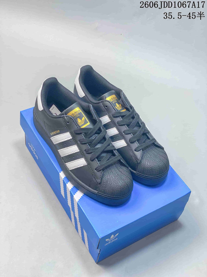 Adidas Superstar Shell-Toe Sneakers in White and Gray