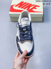 Jordan 1 Low Travis Scott Stüssy-Style Sneakers, White and Navy